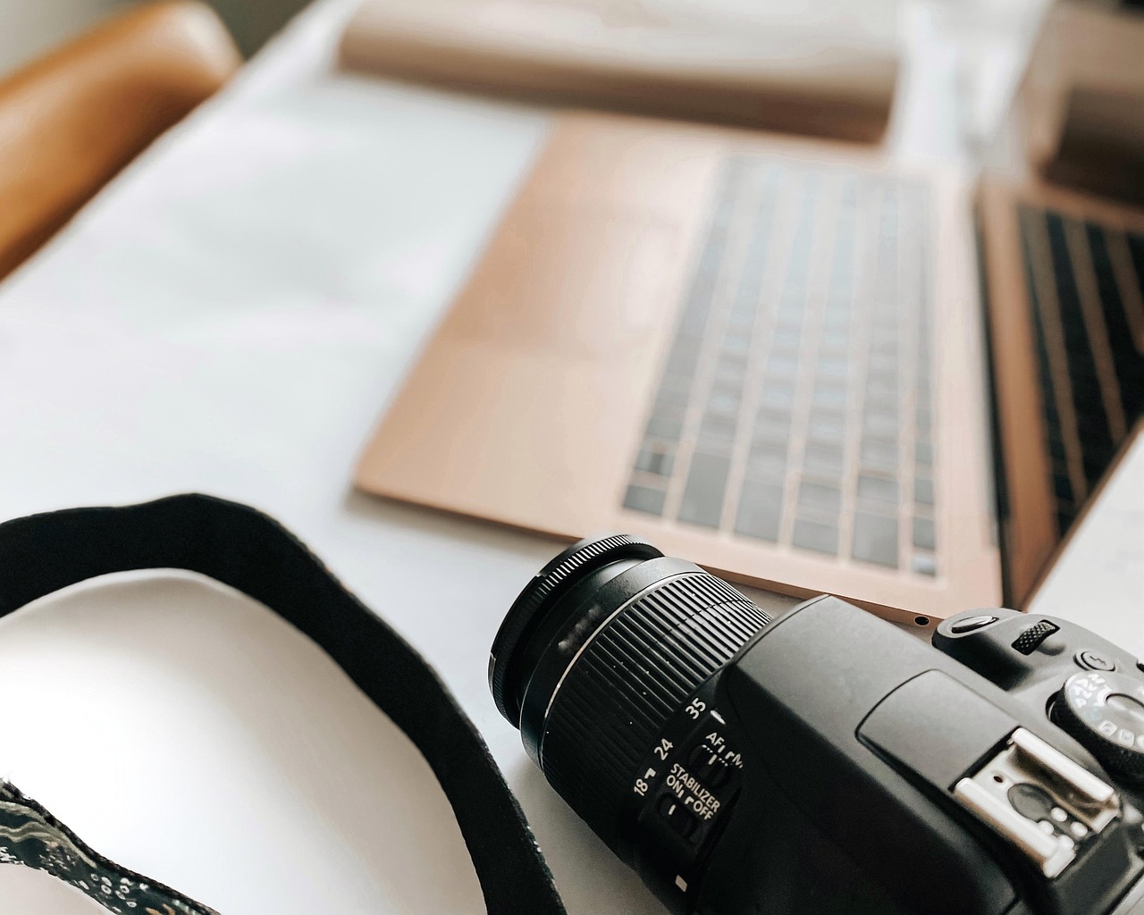 Laptop, camera, desk — Comparing Swiss Replica Watches to Authentic Models
